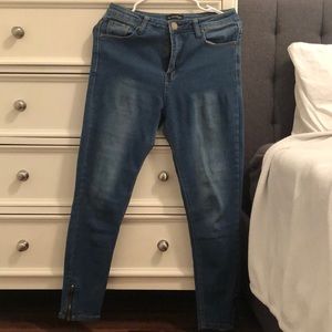 Classic blue jeans with zippers on the legs